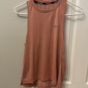 Nike salmon pink tank top, size xs, no tag, worn once.